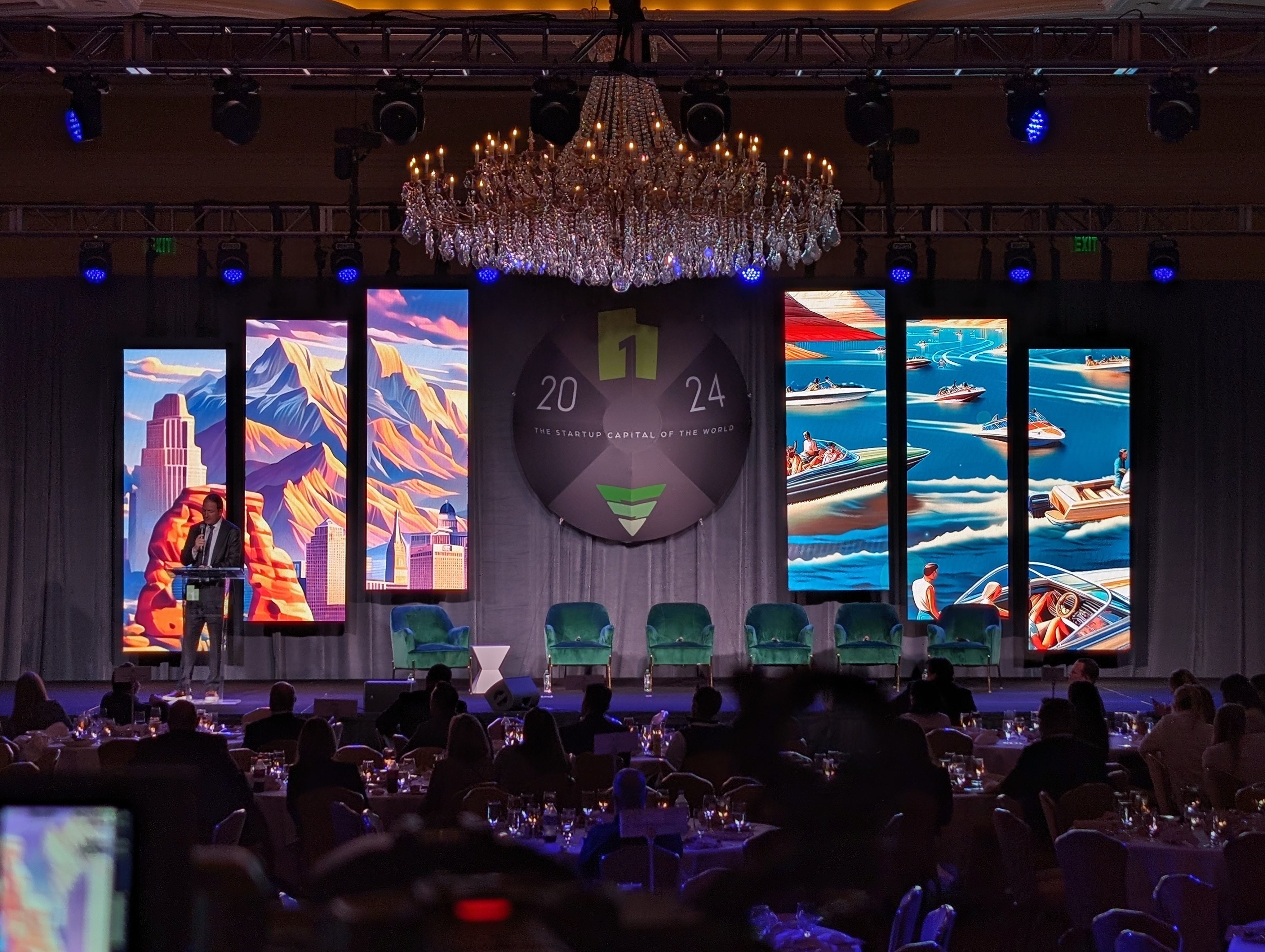 Corporate gala with a multi-panel LED video wall and chandelier