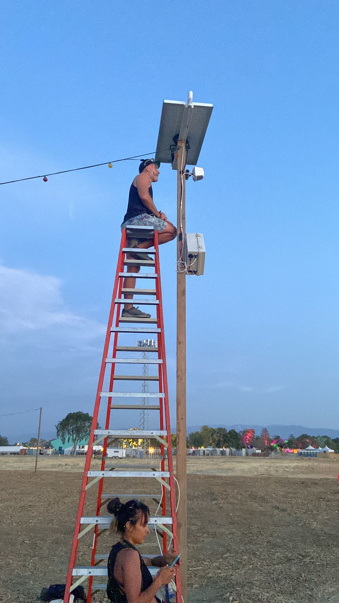 Festival WiFi node installed on a mast in a field