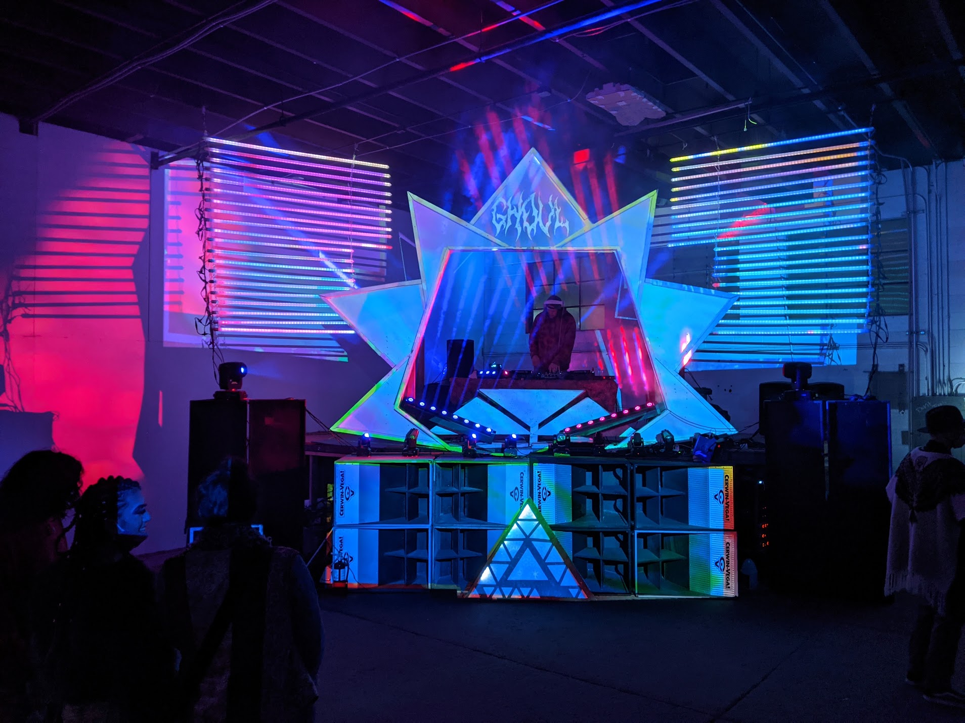 Star-shaped LED stage at a warehouse event