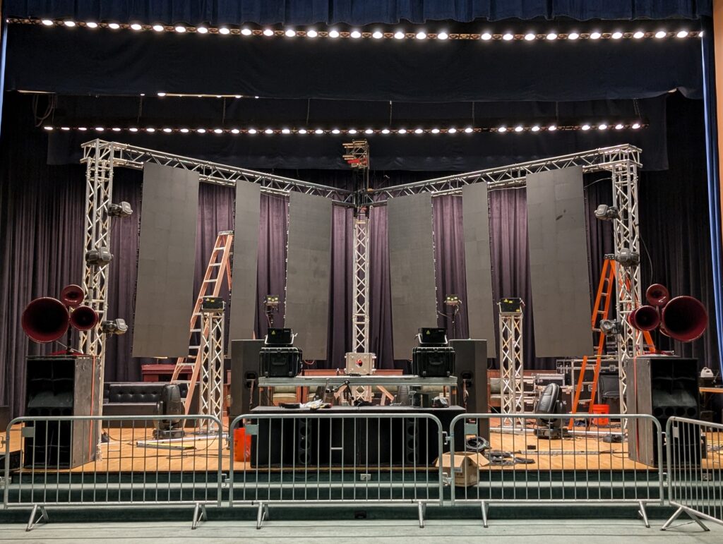 Truss and barricade during a stage load-in